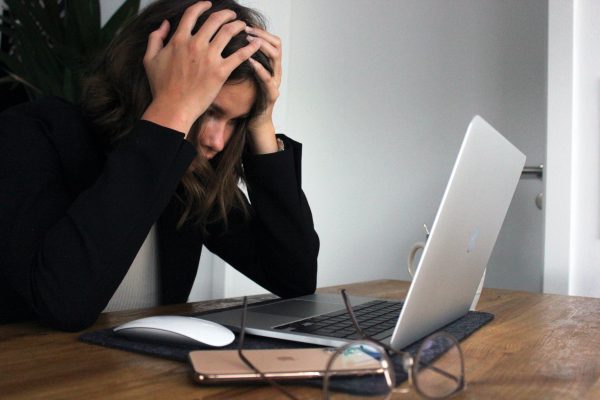An image of a women stressed