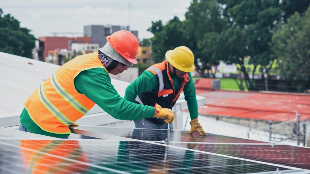 engineers installing solar panels